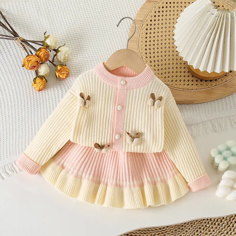 N216-272-1 Cream and pink Knit Skirt and Cardigan Set - Image 1
