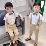 Boys White Shirt, Black / Beige Trouser, Suspender belt and bow tie semi formal suit - Image 5