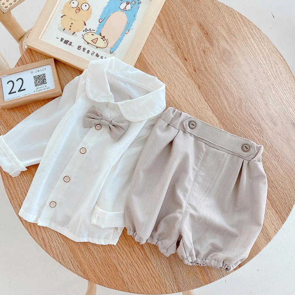 AI-19521 (5) Boys White Full Sleeves Shirt, bow tie and Grey Shorts set - Image 1