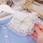 Stylish and Elegant Blue Blouse with Shoulder Bow & White Skirt Set for Girls - Image 2