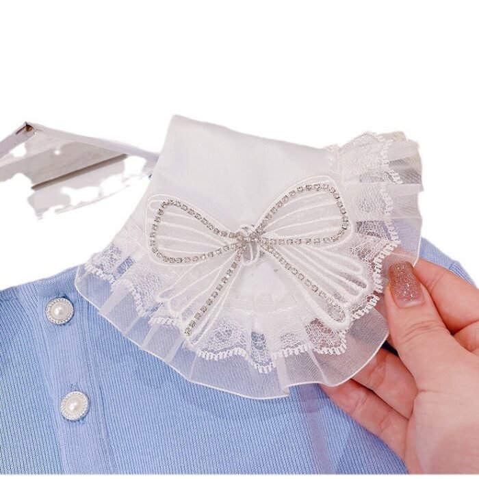 Stylish and Elegant Blue Blouse with Shoulder Bow & White Skirt Set for Girls - Image 4